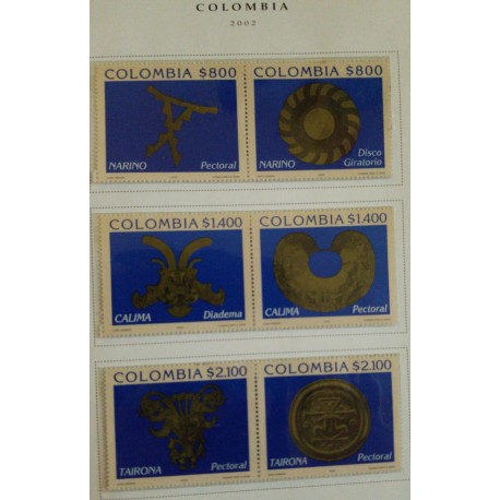A) 2002, COLOMBIA, PRE-COLUMBIAN ART, ROTATING DISC, PECTORAL – NARIÑO, DIADEMA, PECTORAL – CALIMA, PECTORAL - TAIRONA